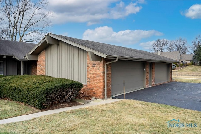 view of property exterior with a garage and a yard