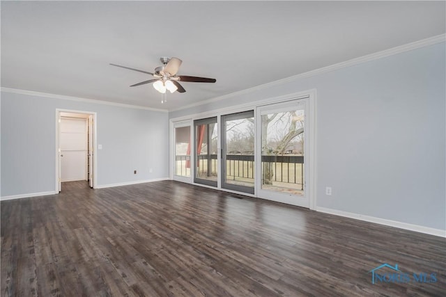 empty room with crown molding, dark hardwood / wood-style floors, and ceiling fan