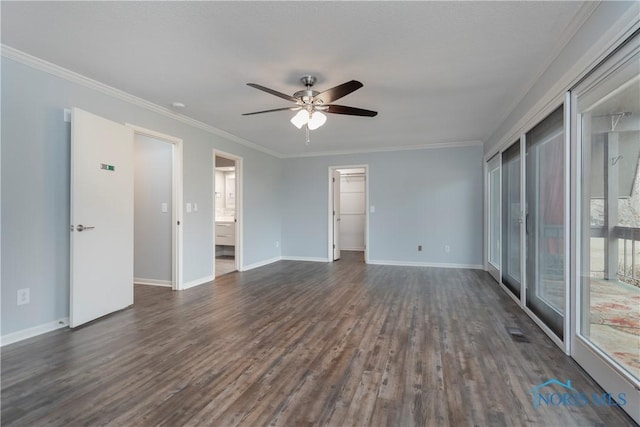 unfurnished room featuring crown molding, dark wood-type flooring, and ceiling fan