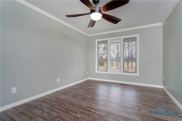 unfurnished room with ornamental molding, dark hardwood / wood-style floors, and ceiling fan