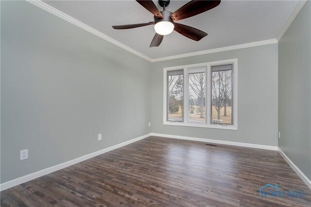 29620 Gleneagles Rd Unit C, Perrysburg, OH 43551 - spare room with baseboards, crown molding, dark wood-style floors, and ceiling fan
