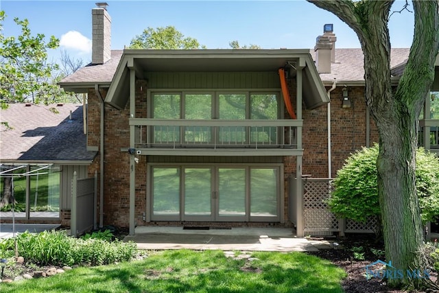 29620 Gleneagles Rd Unit C, Perrysburg, OH 43551 - rear view of property featuring a chimney, french doors, and brick siding