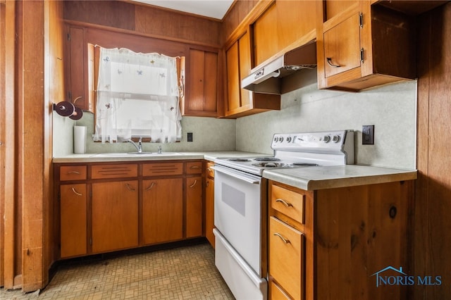 kitchen featuring sink and white electric range