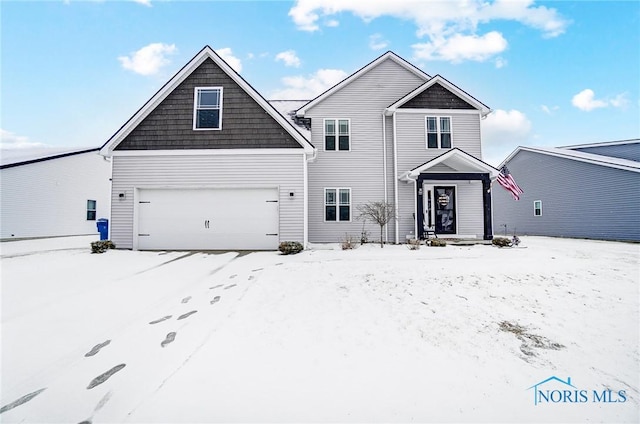 view of front of home with a garage