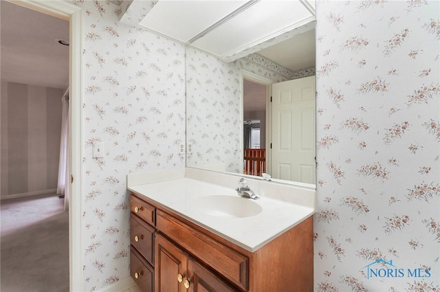 bathroom with vanity and a skylight