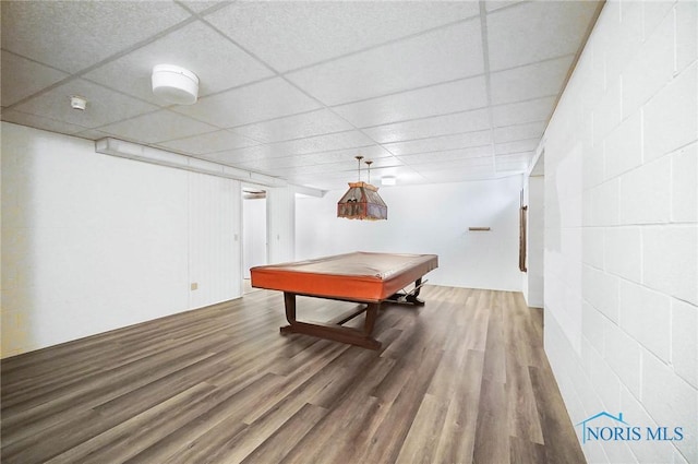 rec room with a paneled ceiling, hardwood / wood-style floors, and billiards