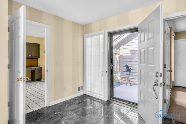 3865 River Rd, Toledo, OH 43614 - entryway with baseboards and visible vents