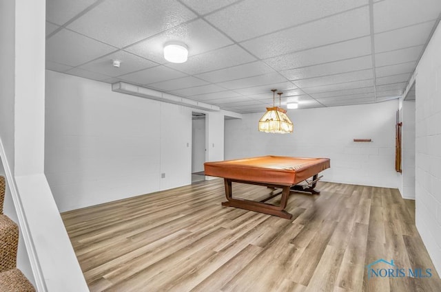 3865 River Rd, Toledo, OH 43614 - game room with concrete block wall, pool table, a paneled ceiling, and light wood-style floors