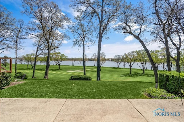 3865 River Rd, Toledo, OH 43614 - view of home's community with a water view, golf course view, and a yard