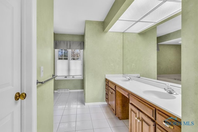 3865 River Rd, Toledo, OH 43614 - bathroom with a sink, tile patterned floors, double vanity, and visible vents