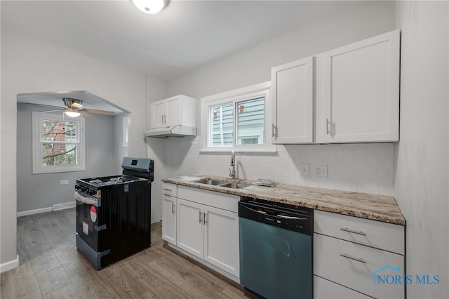 kitchen with stainless steel dishwasher, sink, gas stove, and white cabinets