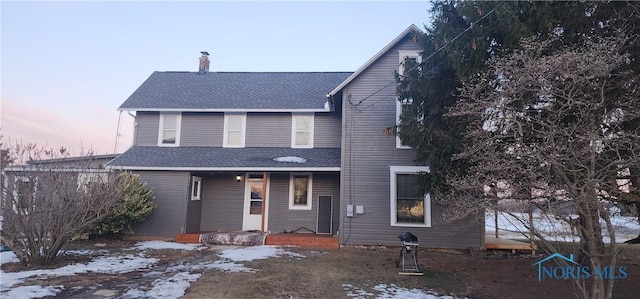 view of property with covered porch