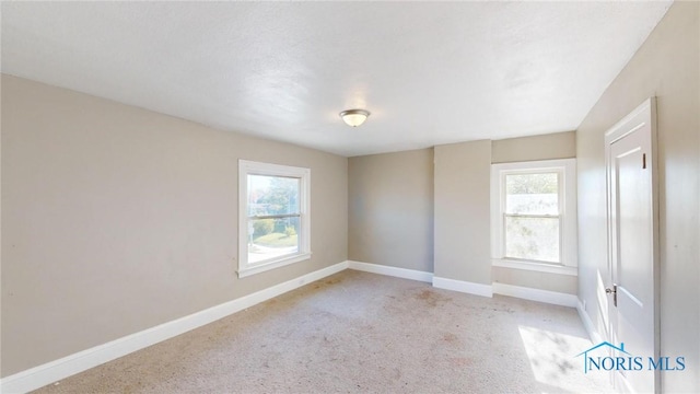 view of carpeted empty room