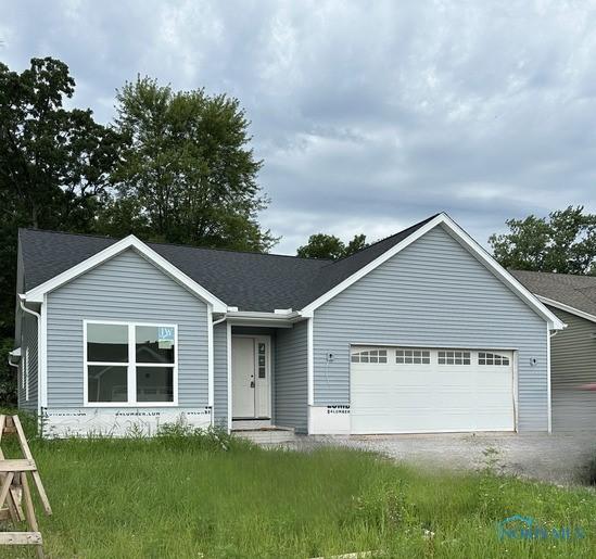 2019 Oakside, Toledo, OH 43615 - ranch-style house with a garage, driveway, and roof with shingles