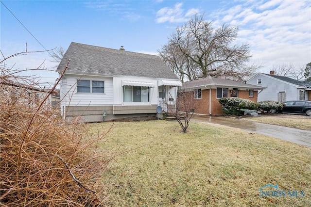 bungalow with a front yard