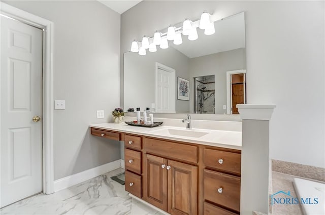 bathroom with vanity and a shower