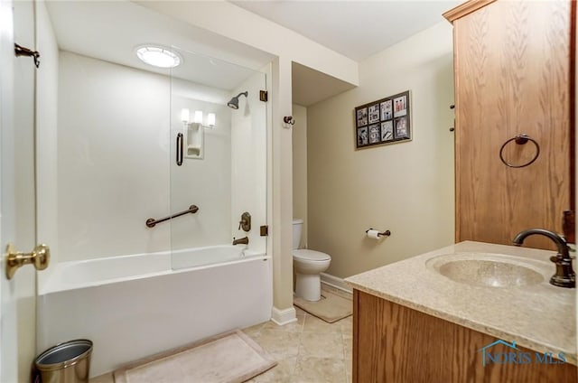 full bathroom featuring tile patterned floors, vanity, toilet, and tub / shower combination