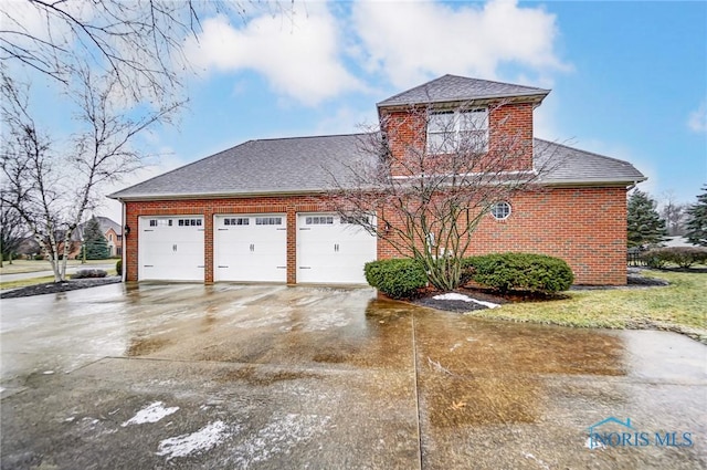 view of home's exterior featuring a garage