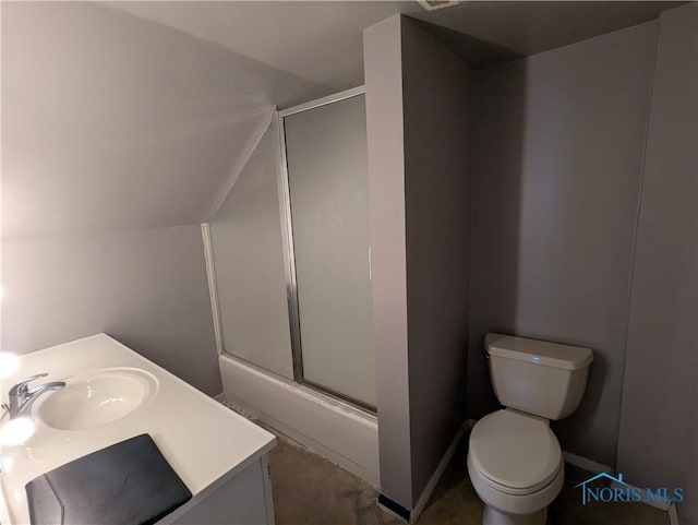 full bathroom featuring shower / bath combination with glass door, vanity, toilet, and vaulted ceiling