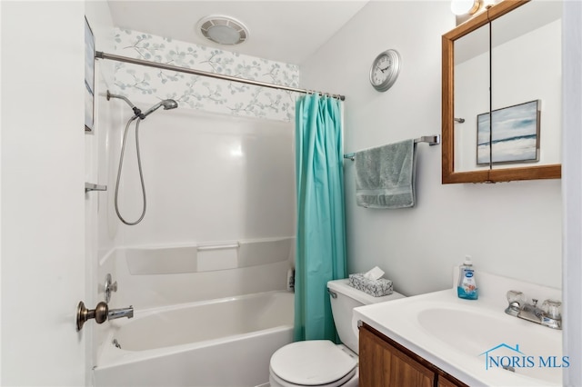 full bathroom featuring vanity, toilet, and shower / bath combo with shower curtain