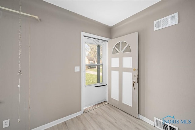 foyer featuring light hardwood / wood-style floors