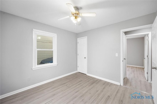 interior space featuring ceiling fan and light wood-type flooring