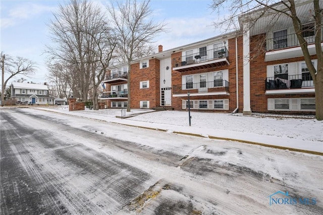 view of snow covered property