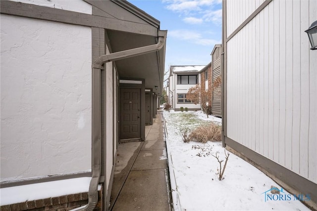 view of snow covered property