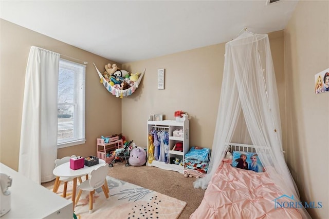 bedroom featuring carpet