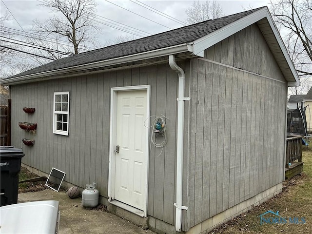 view of outbuilding with a trampoline