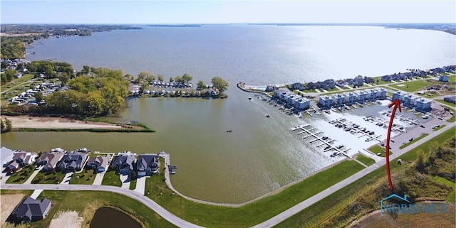 birds eye view of property featuring a water view