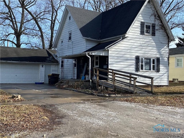 view of front of house featuring a garage and covered porch