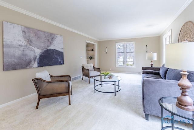 carpeted living room with built in shelves and ornamental molding