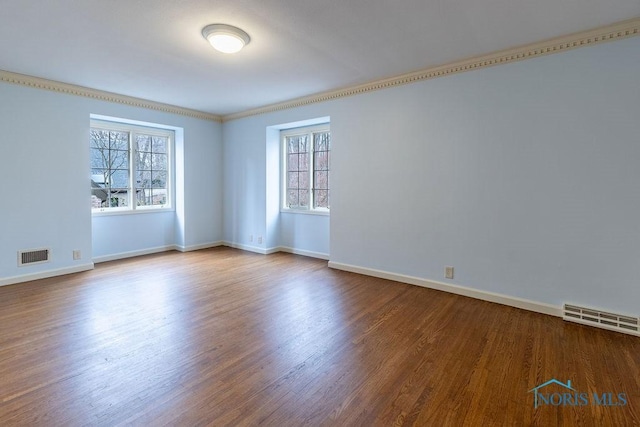 unfurnished room featuring wood-type flooring