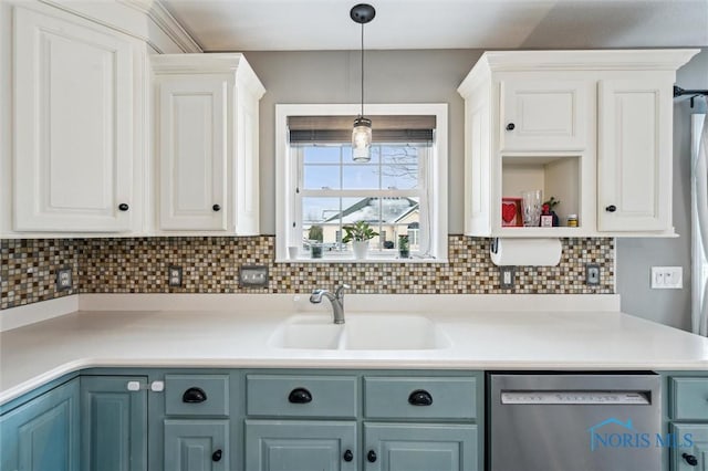 kitchen with blue cabinets, sink, white cabinetry, decorative light fixtures, and dishwasher