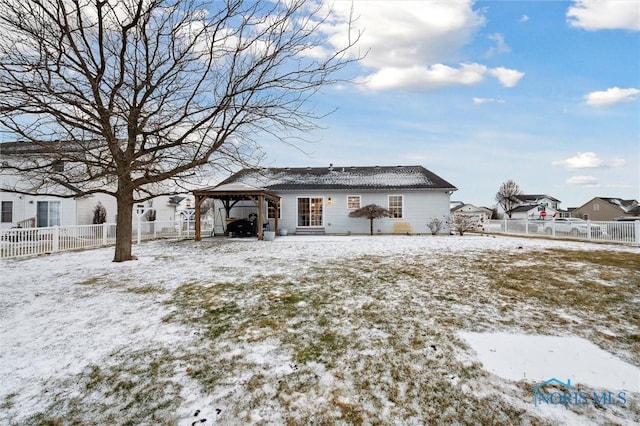 view of snow covered house