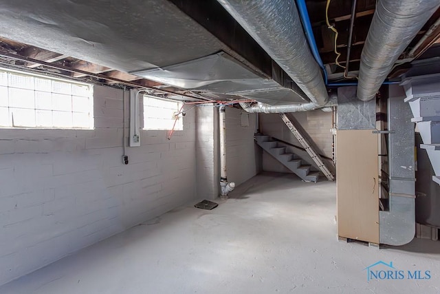 basement featuring heating unit