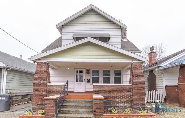 bungalow-style home with a porch