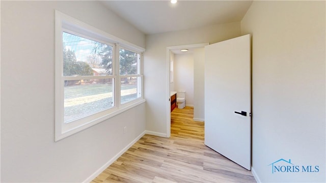 unfurnished room featuring light hardwood / wood-style floors