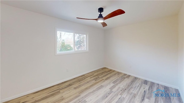 unfurnished room featuring ceiling fan and light hardwood / wood-style floors