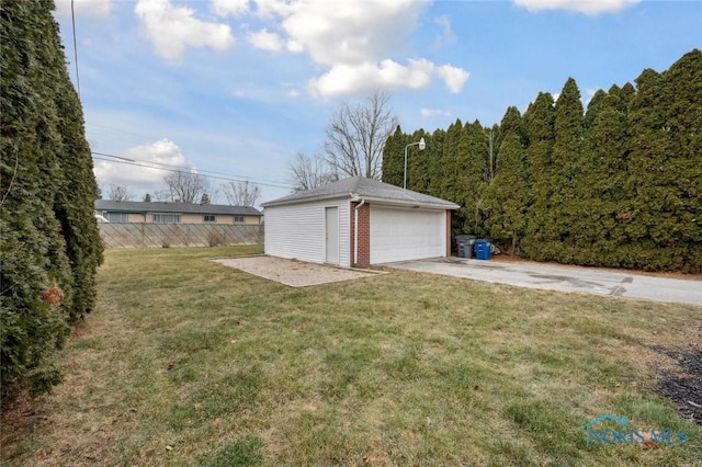 garage featuring a yard