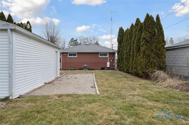 view of yard featuring central AC