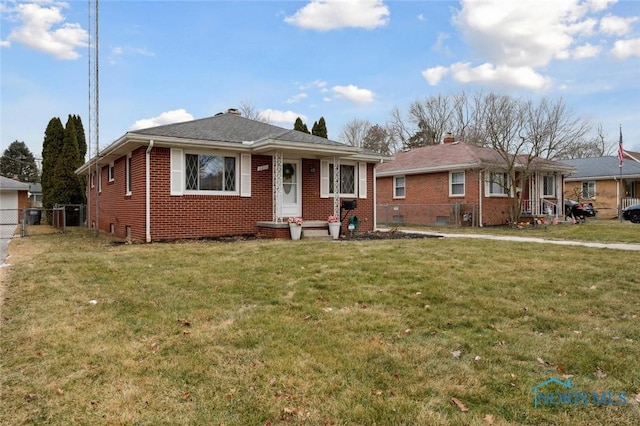 view of front of property with a front lawn