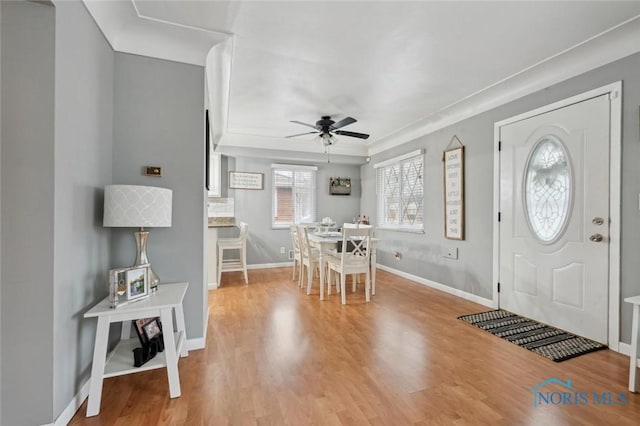 foyer featuring hardwood / wood-style floors and ceiling fan