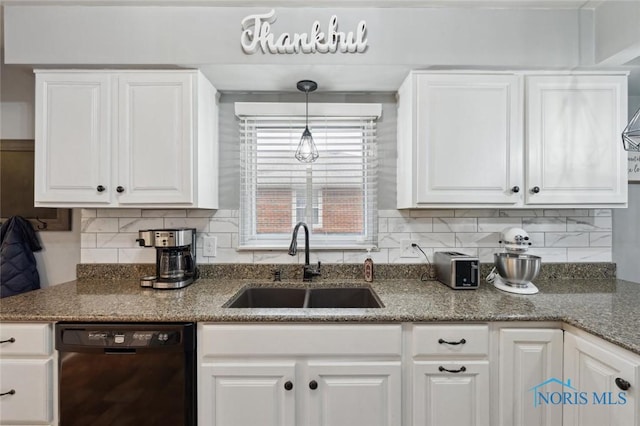 kitchen featuring tasteful backsplash, dishwasher, sink, and white cabinets