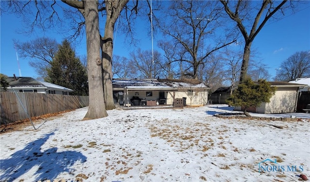 view of snow covered property