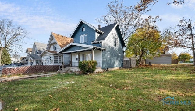 view of front of home with a front lawn