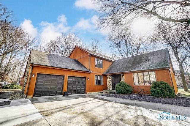 view of front of property featuring a garage