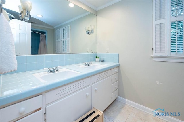 bathroom with tile patterned flooring, crown molding, backsplash, and vanity