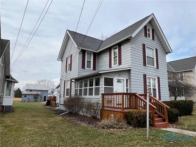 view of front of home featuring a front yard